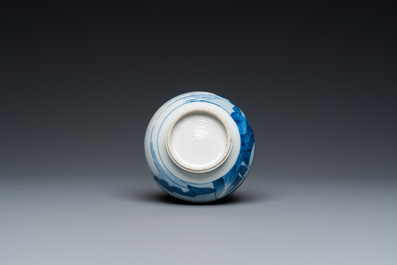 A Chinese blue and white bottle vase with figures in a landscape, Kangxi