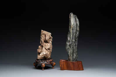 Two Chinese 'gongshi or 'scholar's rocks' on wooden stands, Ming or later