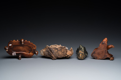 Two Chinese 'gongshi or 'scholar's rocks' on wooden stands, Ming or later