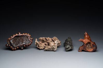Two Chinese 'gongshi or 'scholar's rocks' on wooden stands, Ming or later