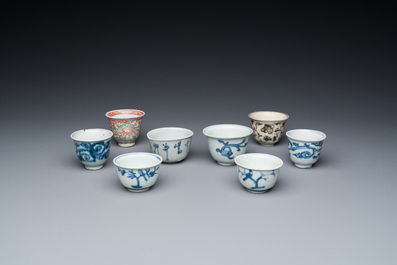 Eight Chinese mostly blue and white wine and tea cups, Ming