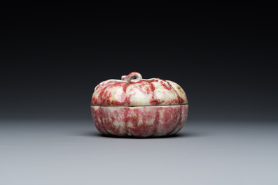 A Chinese peachbloom-glazed pumpkin-shaped box and cover, 19th C.