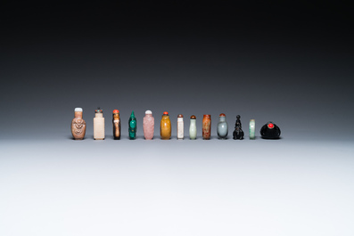 15 Chinese hardstone, glass and walnut snuff bottles, 19/20th C.