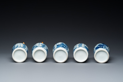 Een Chinees blauw-wit kaststel van vijf vazen met floraal decor, Kangxi