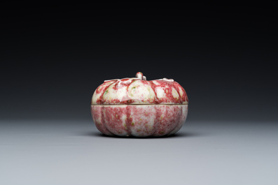 A Chinese peachbloom-glazed pumpkin-shaped box and cover, 19th C.