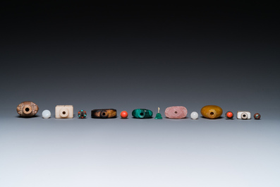 15 Chinese hardstone, glass and walnut snuff bottles, 19/20th C.