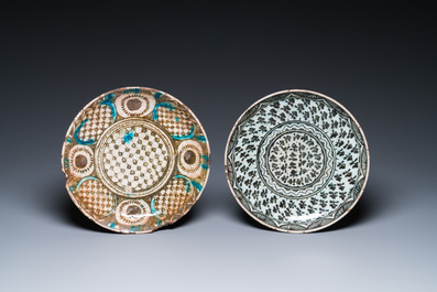 Five blue and white and polychrome Islamic pottery dishes, Qajar, Persia, 19th C.