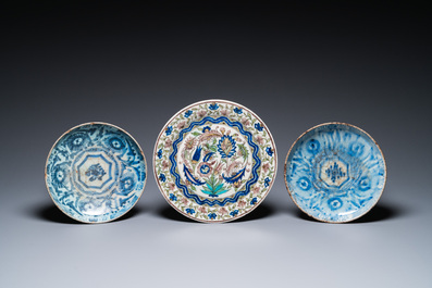 Five blue and white and polychrome Islamic pottery dishes, Qajar, Persia, 19th C.