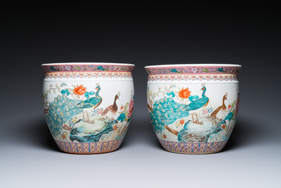 A Chinese famille rose 'hu' vase and a pair of fish bowls, 20th C.