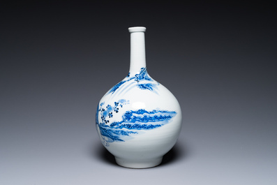 A Japanese blue and white bottle vase with a lady in a landscape, Edo, 17/18th C.