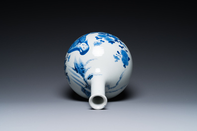 A Japanese blue and white bottle vase with a lady in a landscape, Edo, 17/18th C.
