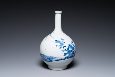 A Japanese blue and white bottle vase with a lady in a landscape, Edo, 17/18th C.