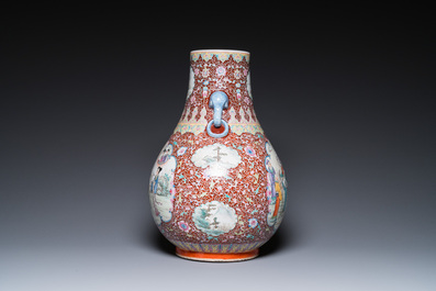 A Chinese famille rose 'hu' vase and a pair of fish bowls, 20th C.