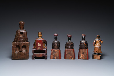 Six Chinese partly gilded wooden sculptures of dignitaries and guards, Ming and later