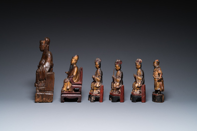 Six Chinese partly gilded wooden sculptures of dignitaries and guards, Ming and later