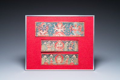Eight tsaklis and three painted wood book covers, Tibet, 19th C.