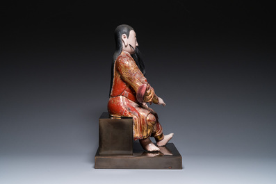 A large Chinese lacquered and polychromed wood sculpture of Guandi, 18th C.