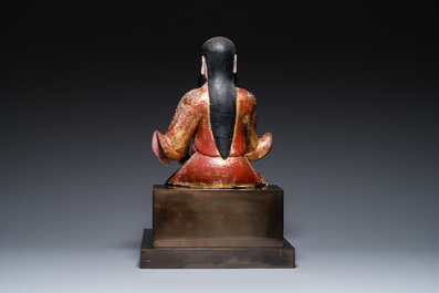 A large Chinese lacquered and polychromed wood sculpture of Guandi, 18th C.