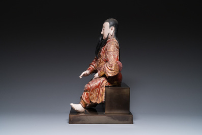 A large Chinese lacquered and polychromed wood sculpture of Guandi, 18th C.