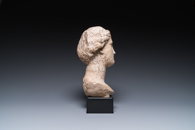 A Roman limestone head of a female, probably Pannonia province, 1st/4th C.