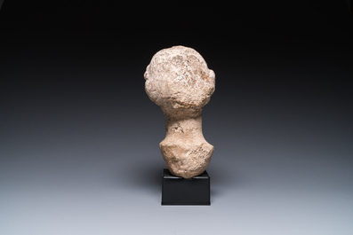 A Roman limestone head of a female, probably Pannonia province, 1st/4th C.