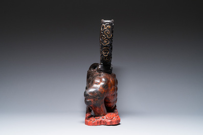 A large Chinese lacquered wooden stand in the shape of a three-legged toad, Ming