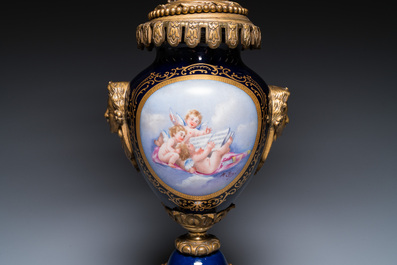 A large three-piece S&egrave;vres-style clock garniture with gilt bronze mounts, France, 19th C.