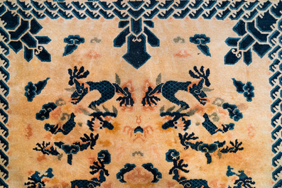 A large Chinese Ningxia rug with dragons on a yellow ground, Tai He Tian 太和殿 mark, 19th C.