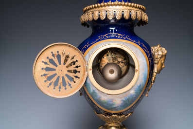 A large three-piece S&egrave;vres-style clock garniture with gilt bronze mounts, France, 19th C.
