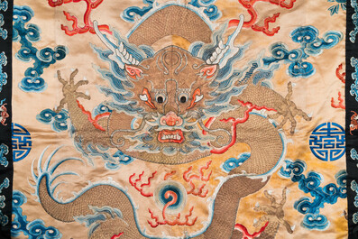 A large Chinese gold-thread-embroidered silk panel with an imperial dragon, 19th C.
