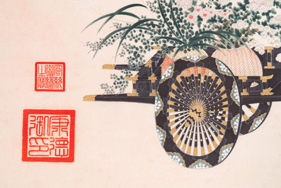 Navolger van Qu Zhaolin 屈兆麟 (1866-1937): 'Drie karren met bloemen',  inkt en kleur op papier, gedateerd 1945