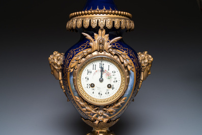 A large three-piece S&egrave;vres-style clock garniture with gilt bronze mounts, France, 19th C.