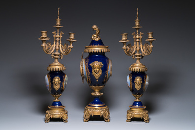 A large three-piece S&egrave;vres-style clock garniture with gilt bronze mounts, France, 19th C.