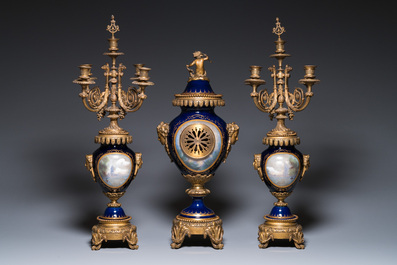 A large three-piece S&egrave;vres-style clock garniture with gilt bronze mounts, France, 19th C.