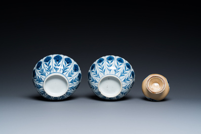 Two Chinese blue and white bowls, a small plate and a caf&eacute;-au-lait ground sprinkler, Kangxi