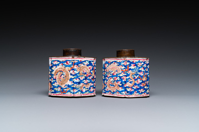 A pair of Chinese Canton enamel tea caddies and covers with dragons among clouds, Qianlong