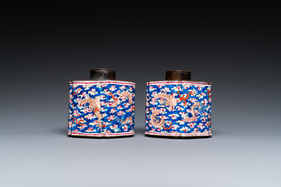 A pair of Chinese Canton enamel tea caddies and covers with dragons among clouds, Qianlong