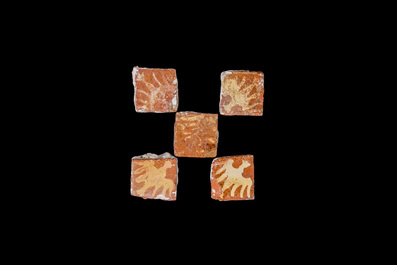Ten medieval tiles with eagles and flowers, 14th C.
