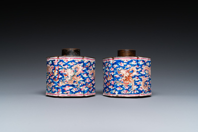 A pair of Chinese Canton enamel tea caddies and covers with dragons among clouds, Qianlong