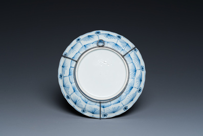 Two Chinese blue and white bowls, a small plate and a caf&eacute;-au-lait ground sprinkler, Kangxi