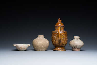 A Chinese qingbai-glazed ear cup, two celadon jarlets and a brown-glazed jug and cover, Han and later