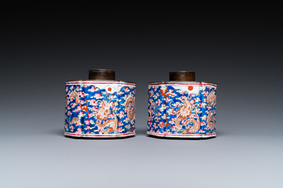 A pair of Chinese Canton enamel tea caddies and covers with dragons among clouds, Qianlong