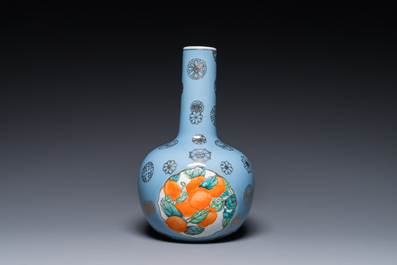 A Chinese lavender blue-ground bottle vase with fruit medallions, Republic