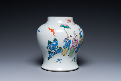 A Chinese famille rose 'playing boys' vase on a fine carved wooden stand, Yongzheng