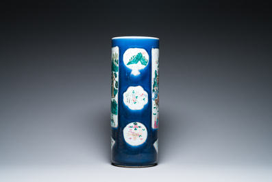 A large Chinese blue-ground famille rose cylindrical vase, 19th C.