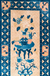 A large Chinese 'antiquities' rug, 19th C.