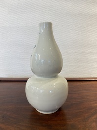 Een Chinese blauw-witte kalebasvaas, 19e eeuw