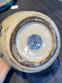 A Vietnamese blue and white Bat Trang stoneware 'dragon' jar and cover, 19/20th C.
