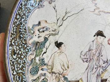A Chinese Canton enamel 'flute players' dish with ruby edge on the back, Yongzheng