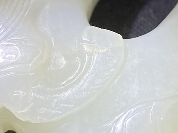 A Chinese 'twin chilong&rsquo; white jade circular pendant, Qing